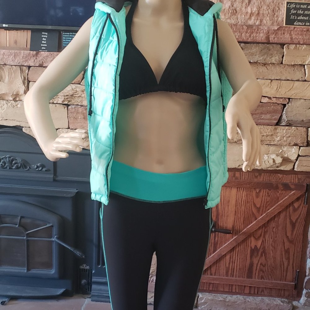 2 items: City Streets puffer vest -sz M & Xersion capri workout pants –sz S